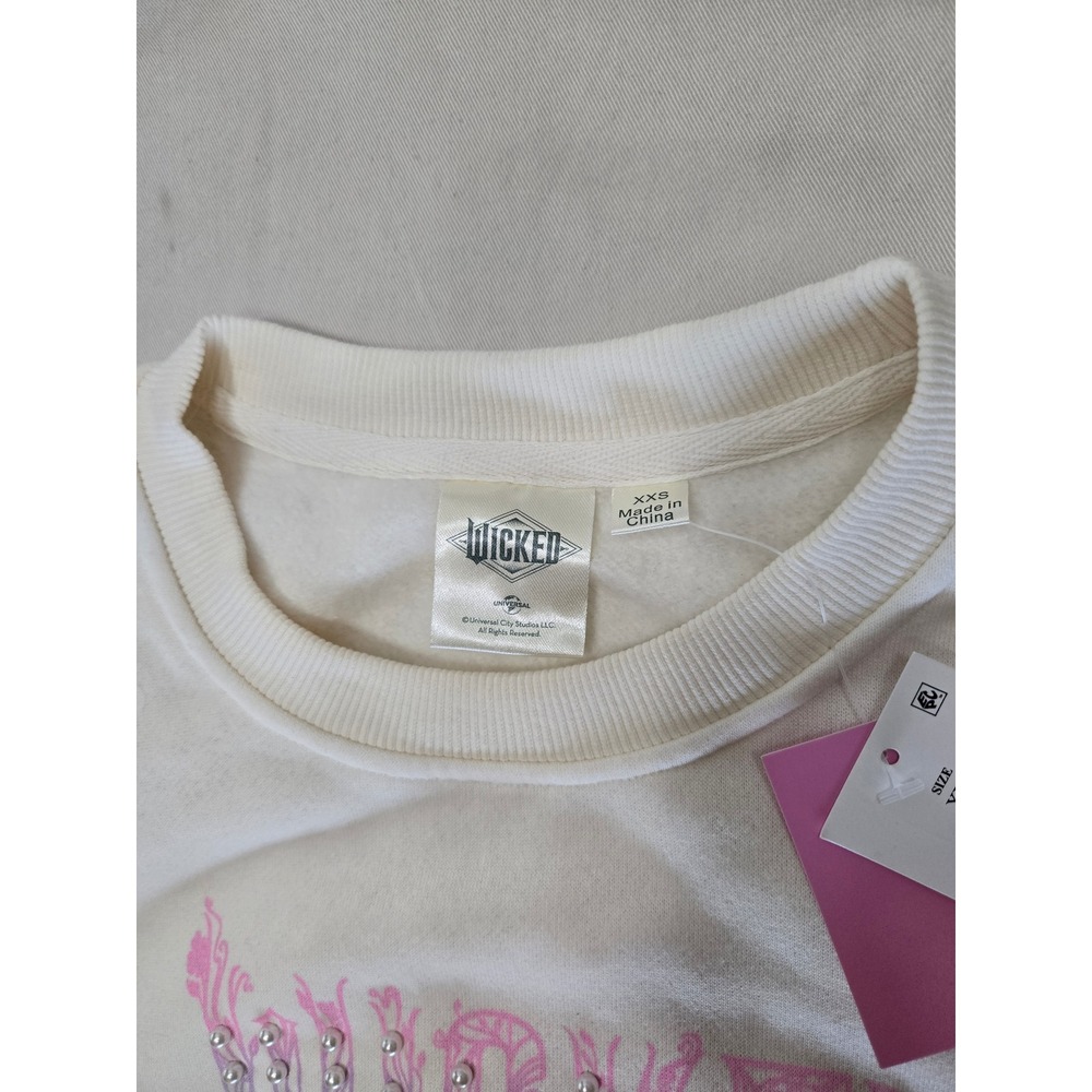 Wicked Movie Butterfly Pearl Graphic Sweatshirt Cream XXS 5UWT01OGLC NWT - Picture 3 of 10